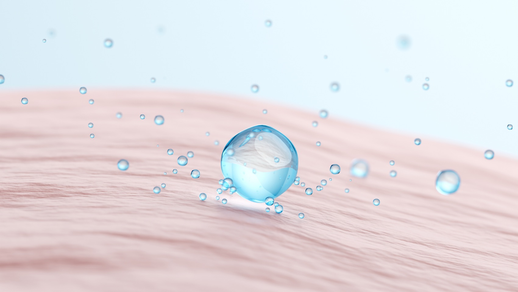 Gota de agua sobre piel — hidratación intensa